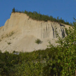 White Channel Gravel, high above the current streambed, on a cliff wall.